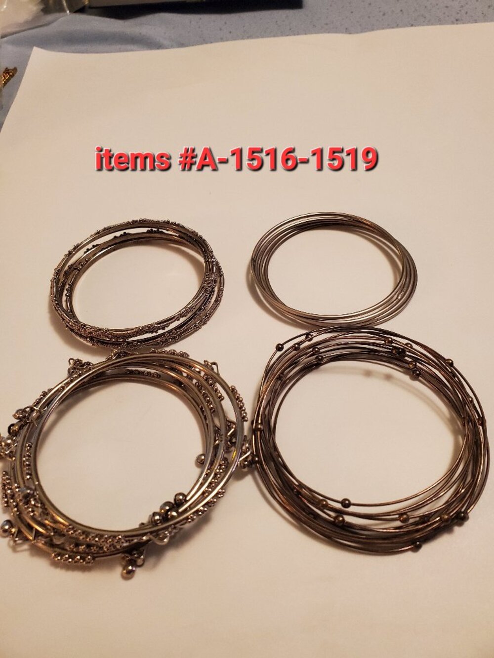 24 Bracelets, items # A -1516-1519, wt. 111 grams.